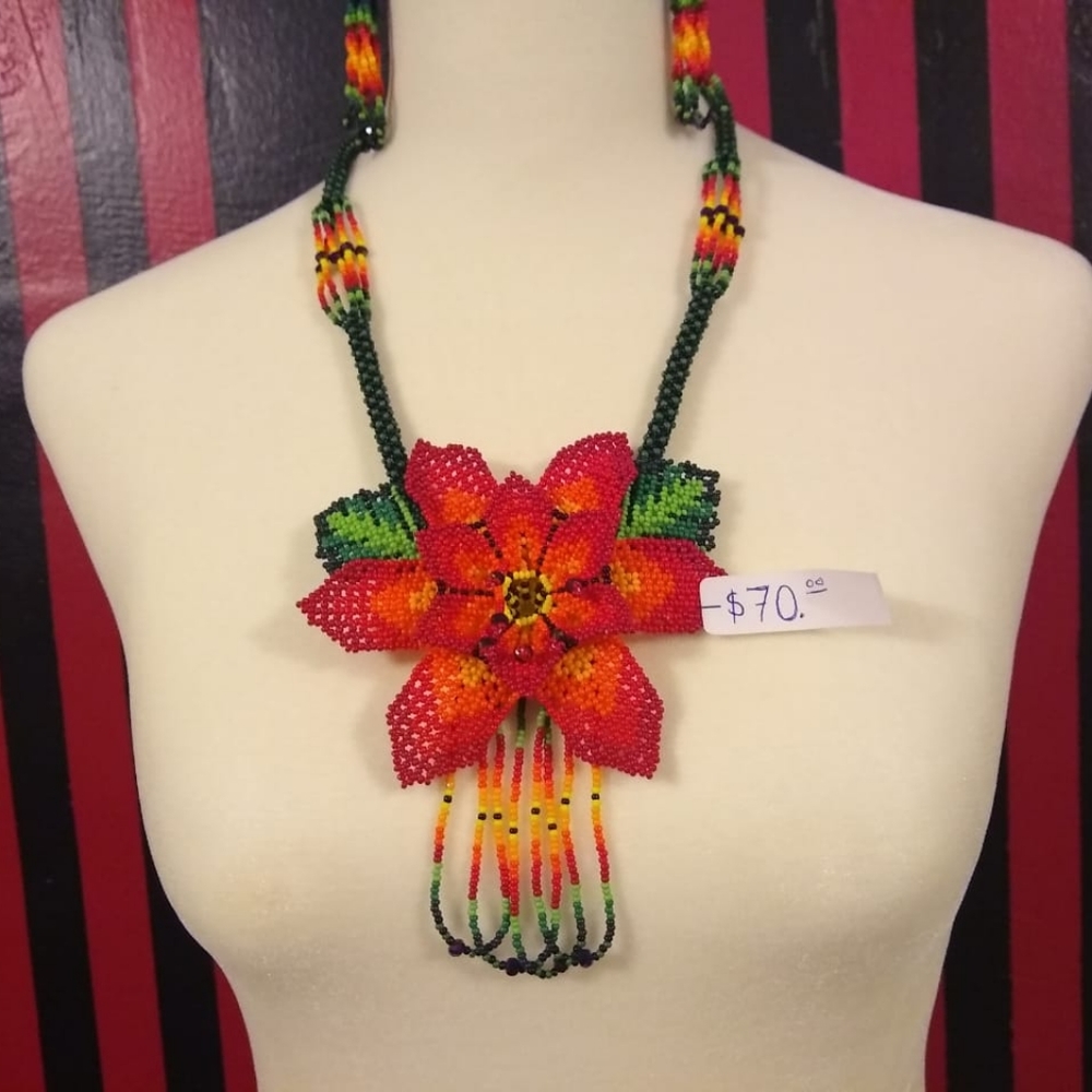 This is a beaded necklace with earrings